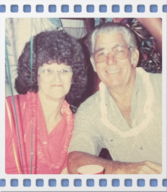 Janice Hart posing with her husband